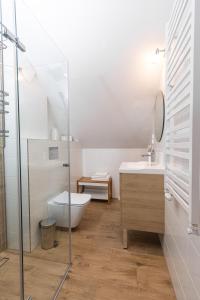 Kúpeľňa v ubytovaní Apartamenty Jantar