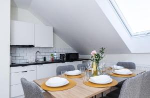 Kuchyňa alebo kuchynka v ubytovaní Apartamenty Jantar