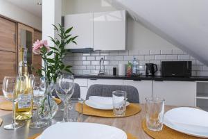 Kuchyňa alebo kuchynka v ubytovaní Apartamenty Jantar