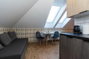 Kuchyňa alebo kuchynka v ubytovaní Apartamenty Jantar