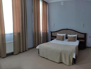 Postel nebo postele na pokoji v ubytování Shindan Hotel Astara