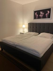Postel nebo postele na pokoji v ubytování Idylle auf dem Reiterhof bei Husum