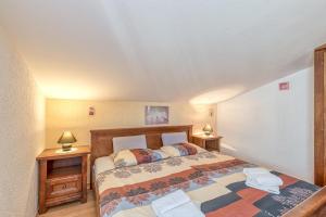 Postel nebo postele na pokoji v ubytování Apartment Slavko Cancini