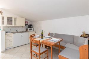 Kuchyň nebo kuchyňský kout v ubytování Apartment Slavko Cancini