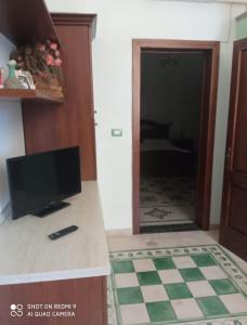 TV a/nebo společenská místnost v ubytování BORGO ANTICO