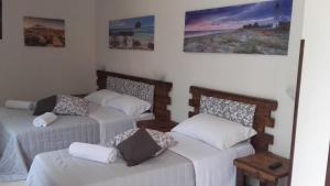 Posteľ alebo postele v izbe v ubytovaní Giulicia B&B