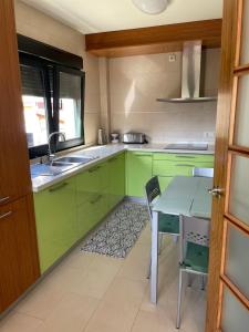 Kuhinja oz. manjša kuhinja v nastanitvi Alquiler vacacional en Fisterra