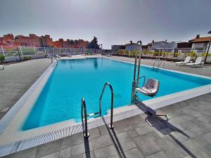 The swimming pool at or close to Ap MAJORERO CALETA