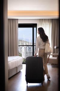 A bed or beds in a room at La Farine Rooms