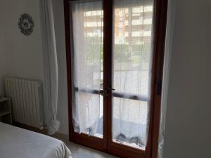 Postel nebo postele na pokoji v ubytování La casa di Murphy