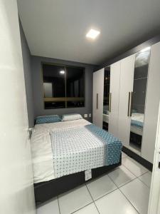 Apartamento Condominio Emilio Hinko - Beira Mar 객실 침대