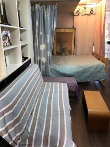 Voodi või voodid majutusasutuse Guest House Hana toas