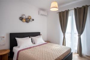 Ένα ή περισσότερα κρεβάτια σε δωμάτιο στο Panteronisia View Villa