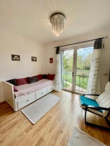 Postel nebo postele na pokoji v ubytování Gartenapartment Storchenblick