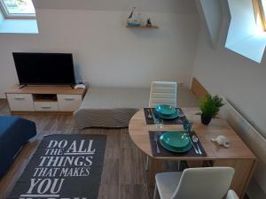 TV o dispositivi per l'intrattenimento presso Szellőrózsa Apartman