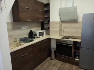 Cucina o angolo cottura di Szellőrózsa Apartman