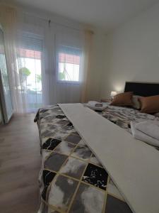 Ένα ή περισσότερα κρεβάτια σε δωμάτιο στο Apartment Barba View