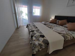 Ένα ή περισσότερα κρεβάτια σε δωμάτιο στο Apartment Barba View