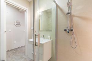 Koupelna v ubytování Allo Apartments Plateros Centro Jacuzzi Comunitario