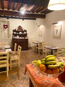 Reštaurácia alebo iné gastronomické zariadenie v ubytovaní La Corte Di Ambra