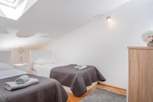 Postel nebo postele na pokoji v ubytování Apartment Maslina ( center of Split)
