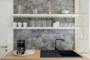 Kuchyňa alebo kuchynka v ubytovaní Apartment Banje Beach 3