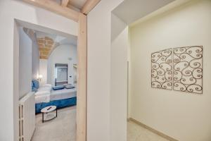Postel nebo postele na pokoji v ubytování Michelangelo B&B