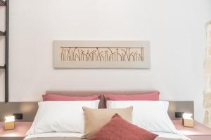 Postel nebo postele na pokoji v ubytování Michelangelo B&B