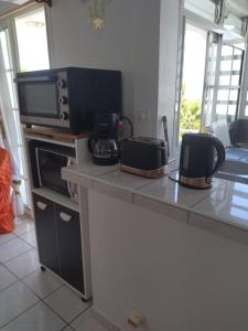 Kuchyň nebo kuchyňský kout v ubytování VILLA KAZALUCE - Appartement 2 chambres