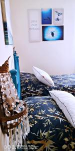 A bed or beds in a room at CASA PAOLINA NEL CENTRO DI BRACCIANO
