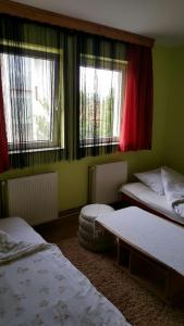 Cama o camas de una habitación en Apartmani Malina 3