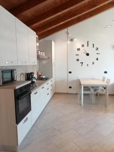 Kuchyň nebo kuchyňský kout v ubytování Casa Olive 2 + 21 fotografií