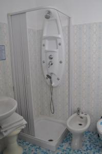 Koupelna v ubytování Hotel Rigobello