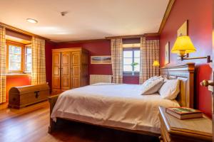 Postel nebo postele na pokoji v ubytování Posada Punta Ballota + 22 fotografií