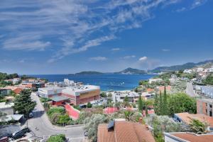 an aerial view of a city and the ocean at Villa Katarina in Budva