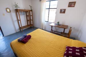 Postel nebo postele na pokoji v ubytování Casa Huipil + 37 fotografií