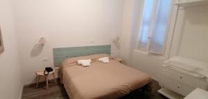 Postel nebo postele na pokoji v ubytování Hotel La Tavernetta