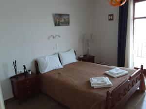 Letto o letti in una camera di Remezzo