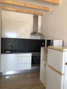 A cozinha ou kitchenette de SOLAR DA SERRA-GuestHouse