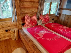 A bed or beds in a room at Ferienhaus - Chalet - Lechtraum