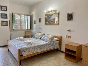 Postel nebo postele na pokoji v ubytování Residenza La Grazia Tropea - Free Parking -