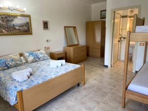 Postel nebo postele na pokoji v ubytování Residenza La Grazia Tropea - Free Parking -