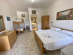 Postel nebo postele na pokoji v ubytování Residenza La Grazia Tropea - Free Parking -