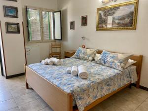Postel nebo postele na pokoji v ubytování Residenza La Grazia Tropea - Free Parking -