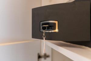 a electrical outlet with a cord plugged into it at La Casetta di Chloè in Ostuni