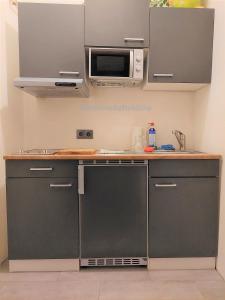 Kuhinja ili čajna kuhinja u objektu 3 Raben - Leoben - Zimmer für Geschäftsreisende, Urlauber, Monteure und Handwerker, Polski Pensjonat Austria