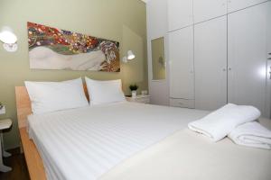 Voodi või voodid majutusasutuse Bianca Suites toas