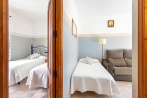 Postel nebo postele na pokoji v ubytování Apartamentos Mundaka Albir