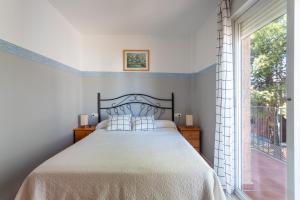 Postel nebo postele na pokoji v ubytování Apartamentos Mundaka Albir