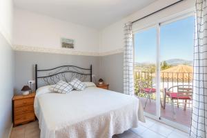 Postel nebo postele na pokoji v ubytování Apartamentos Mundaka Albir